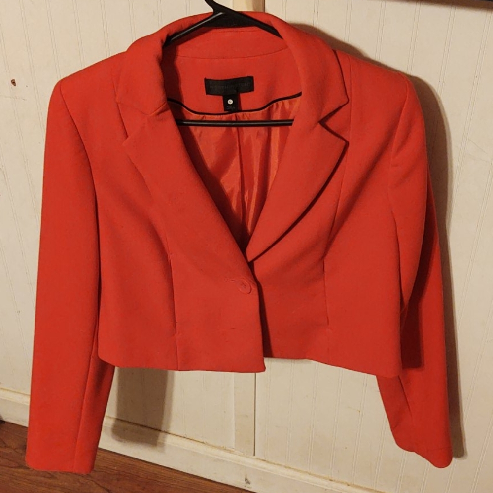 Worthington orange with black trim. Gently used.